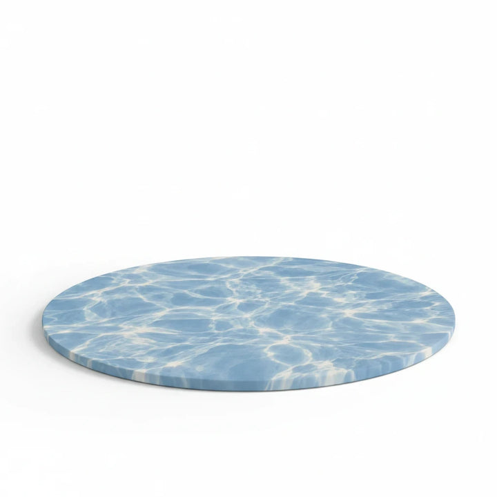 Sunday Theory round mouse pad with a blue water ripple pattern and a non-slip neoprene rubber base