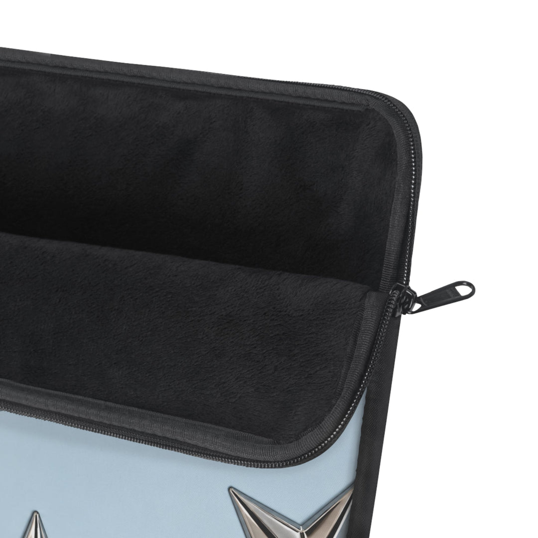 Sunday Theory sky blue laptop sleeve with metallic star details and plush black fleece interior lining