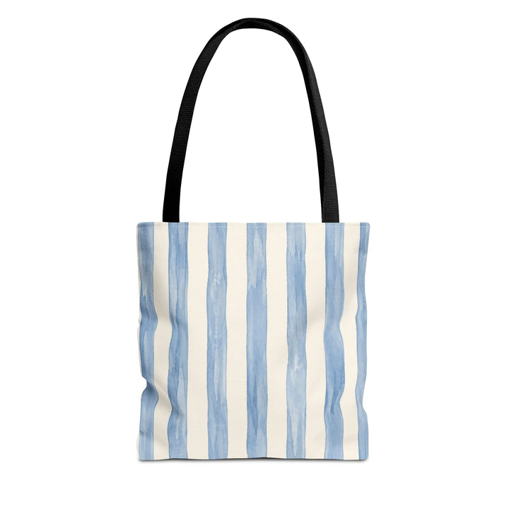 Sunday Theory striped watercolor tote bag in pale blue with black handles, featuring a coastal beachy design.