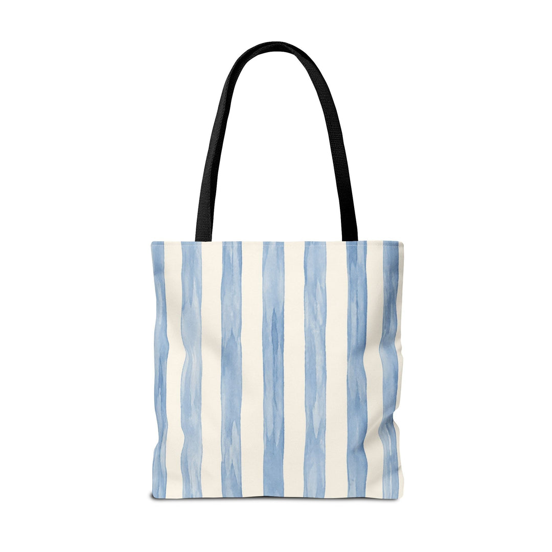 Sunday Theory striped blue watercolor canvas tote bag with black handles and a casual coastal beach style.