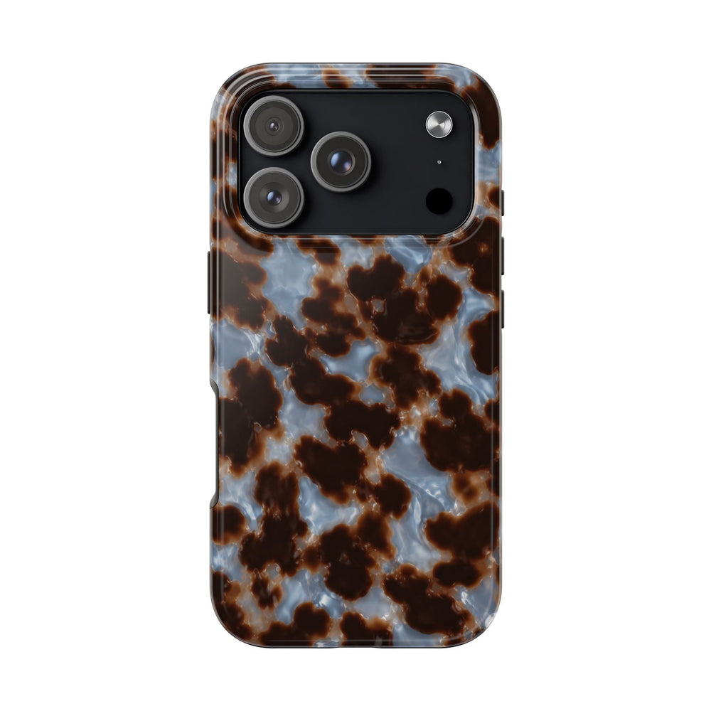 Sunday Theory tortoiseshell phone case with a glossy brown and smoky blue pattern and protective camera cutout