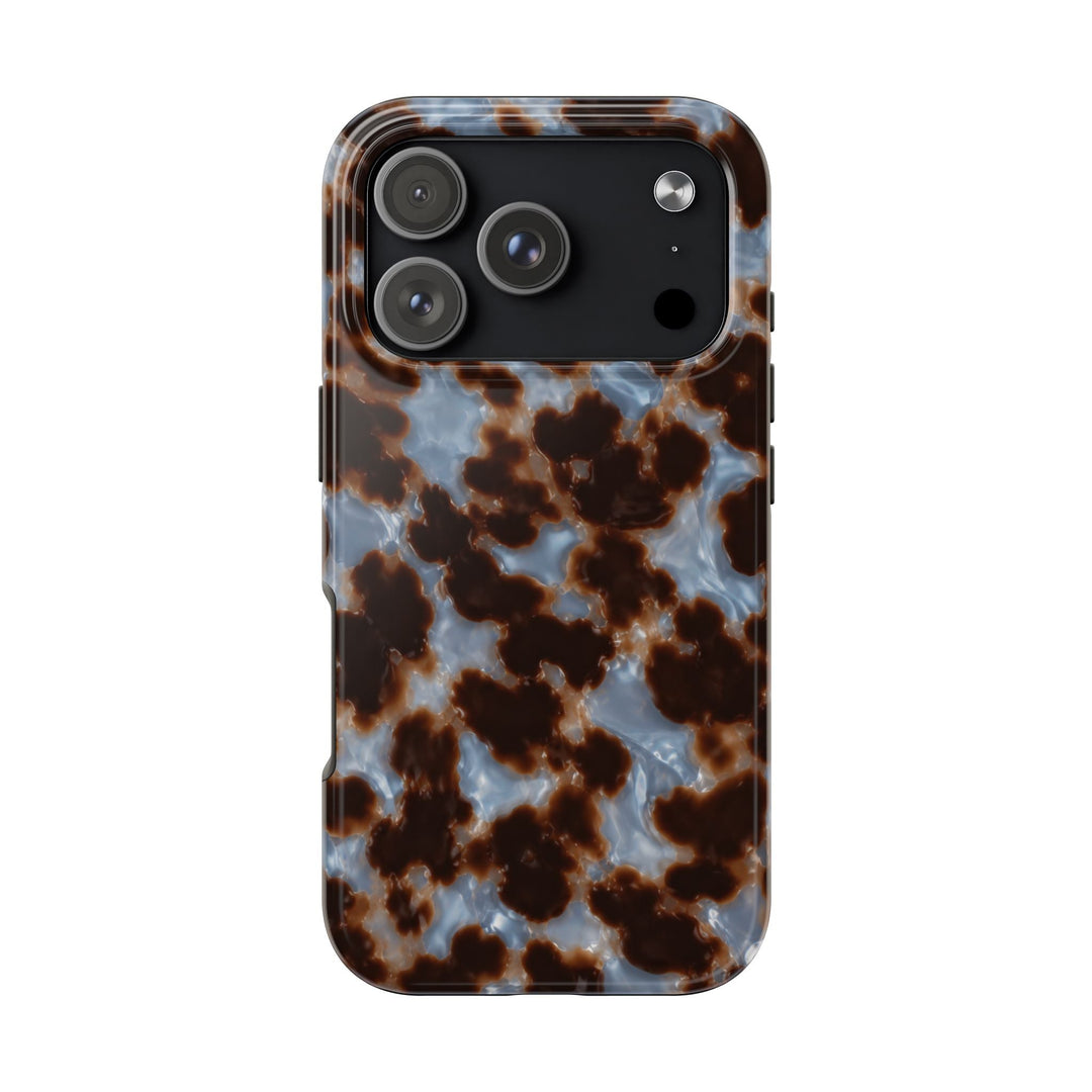 Sunday Theory tortoiseshell phone case with a glossy brown and smoky blue pattern and protective camera cutout
