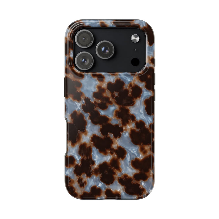 Sunday Theory tortoiseshell phone case with a glossy brown and smoky blue pattern and protective camera cutout