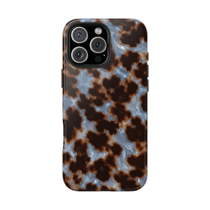 Sunday Theory tortoiseshell phone case with a glossy brown and smoky blue pattern and durable shock-resistant design.