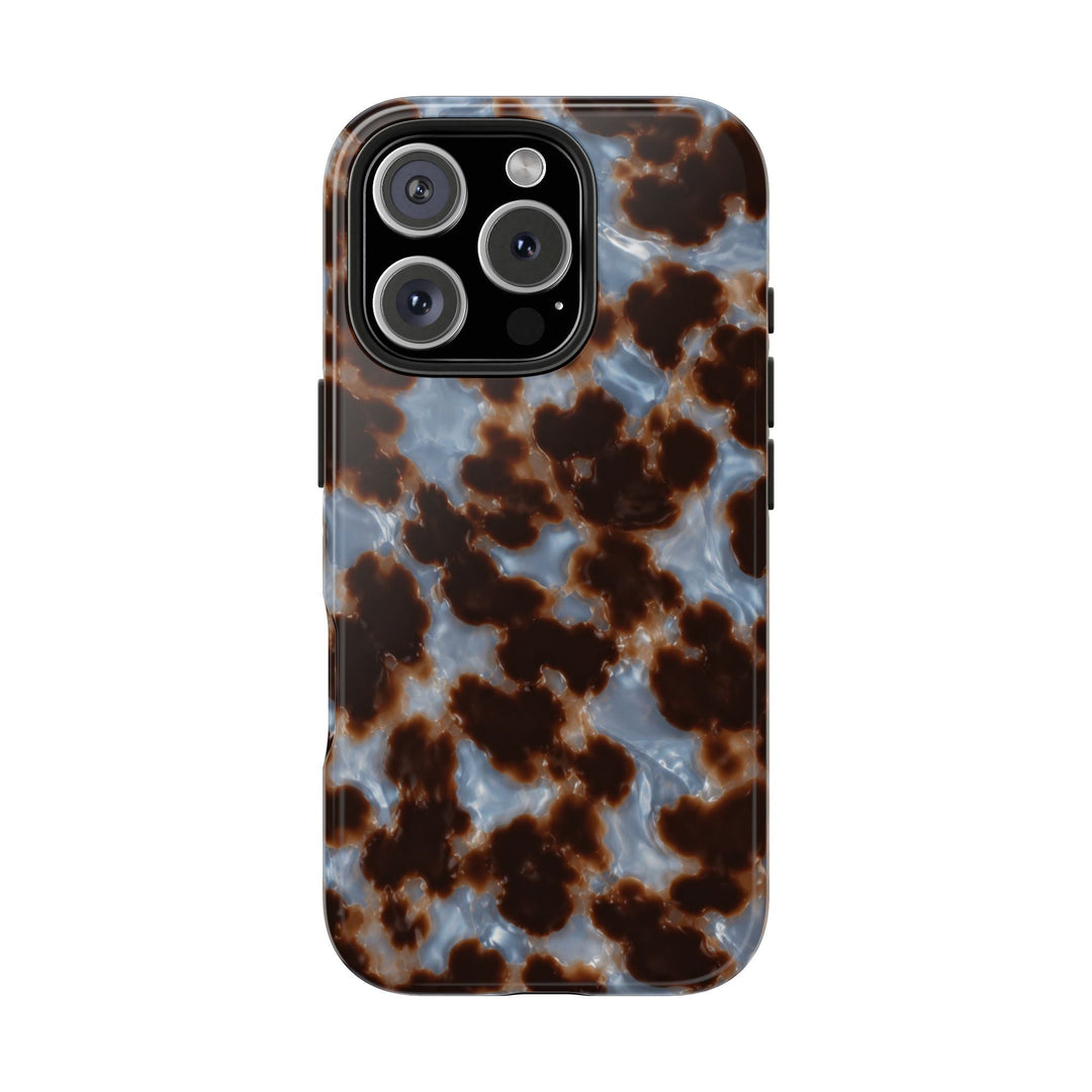 Sunday Theory tortoiseshell phone case with a glossy brown and smoky blue pattern and durable protective design.