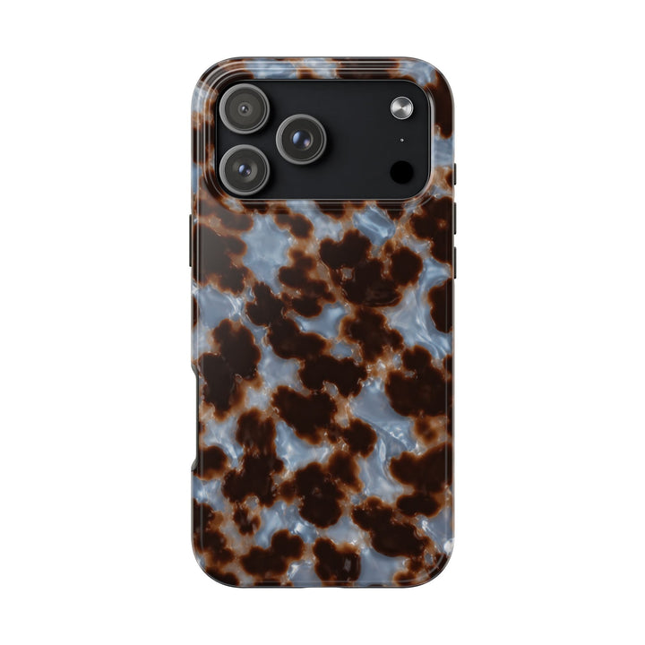 Sunday Theory tortoiseshell phone case with a glossy brown and smoky blue pattern and protective camera cutout.