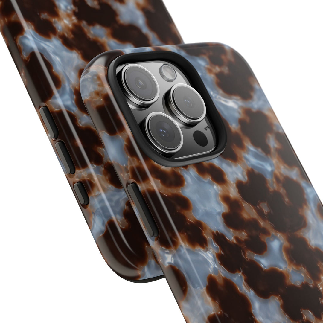 Sunday Theory glossy tortoiseshell phone case in brown and blue with a durable shock-absorbing design